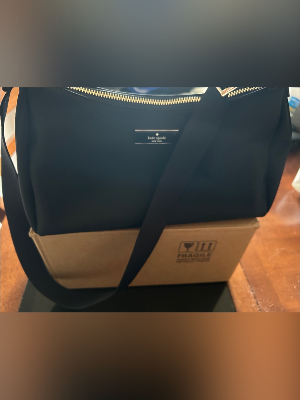 kate spade black nylon messenger bag with gold hardware